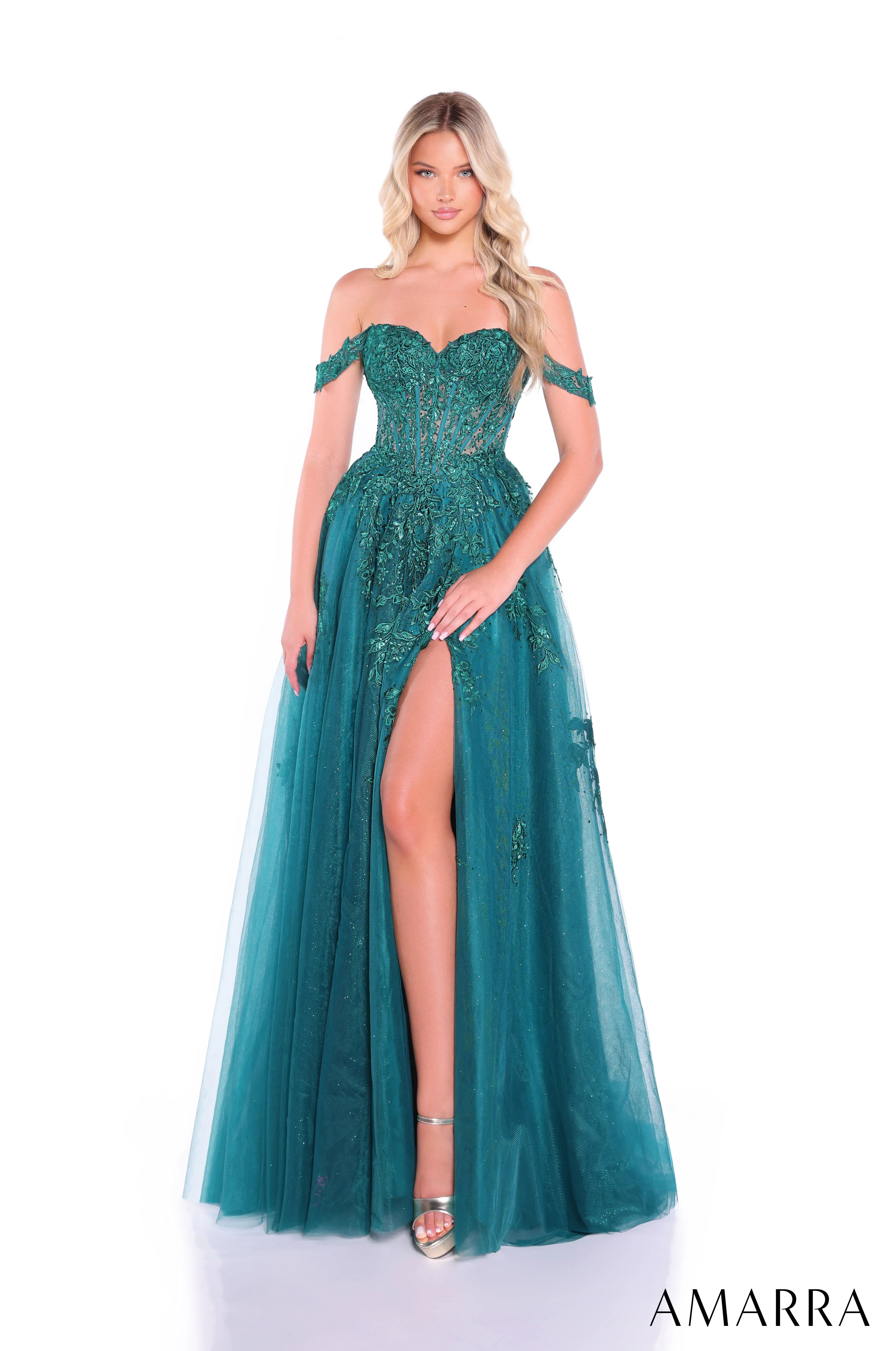 Teal evening gown with off-shoulder design and high slit, modelled by a woman on a white background, brand 'AMARRA' visible.